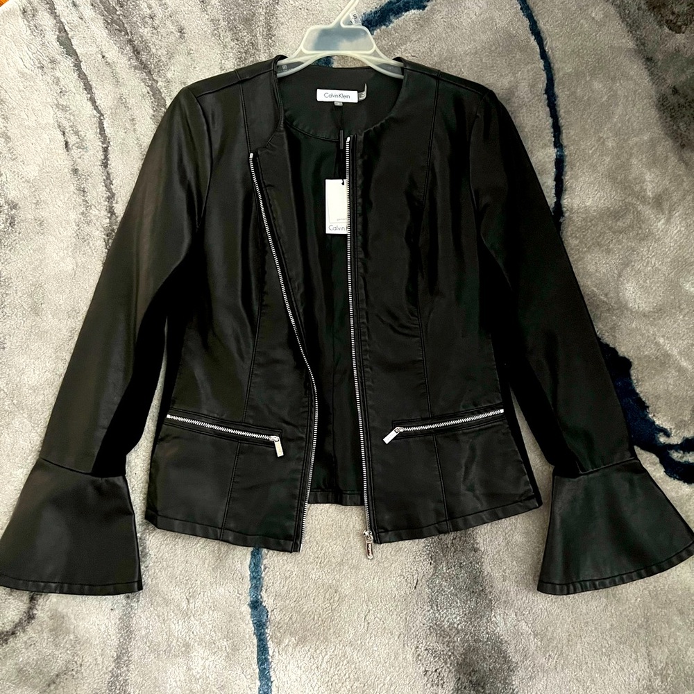 Calvin Klein Genuine Leather Jacket. Super cute arm detail. NWT